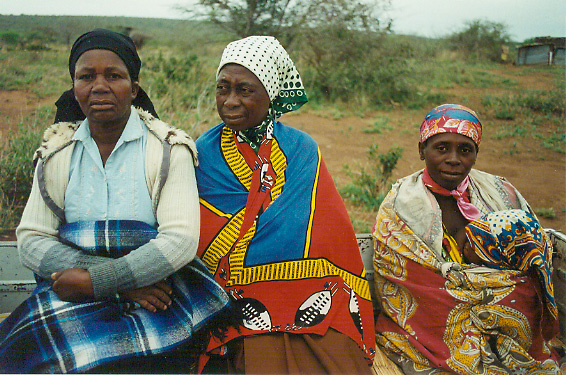 women riding in truck to Ngungwe